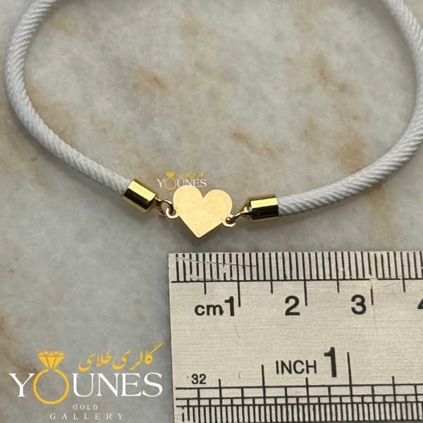 دستبند قلب تو پر طلا لیزری